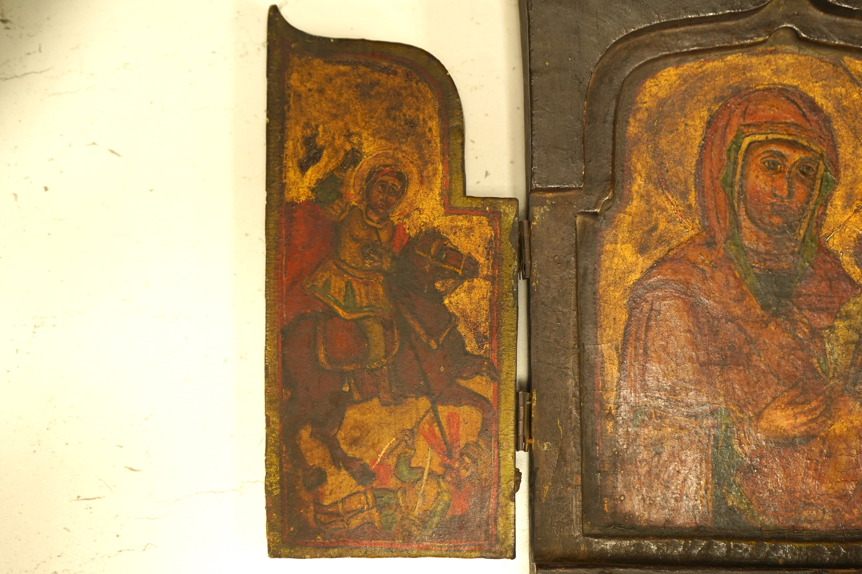 A painted wood triptych icon, 26cm high